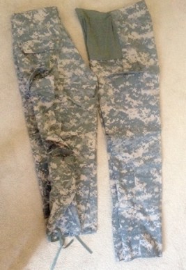 Regular ACU Trousers on the left, Maternity ACU Trousers on the right. Note the belly panel and single small pocket on the maternity pants. See all the pockets on the regular pants?